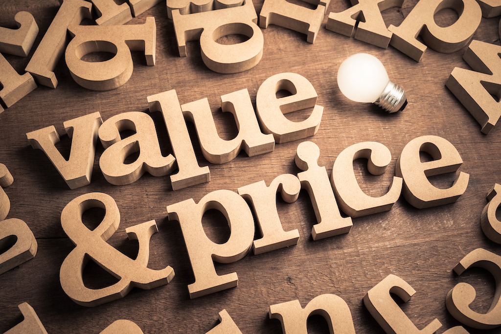 Wooden letters spelling out 'Value & Price' representing Mister Sparky Florences dedication to providing affordable prices and quality service.