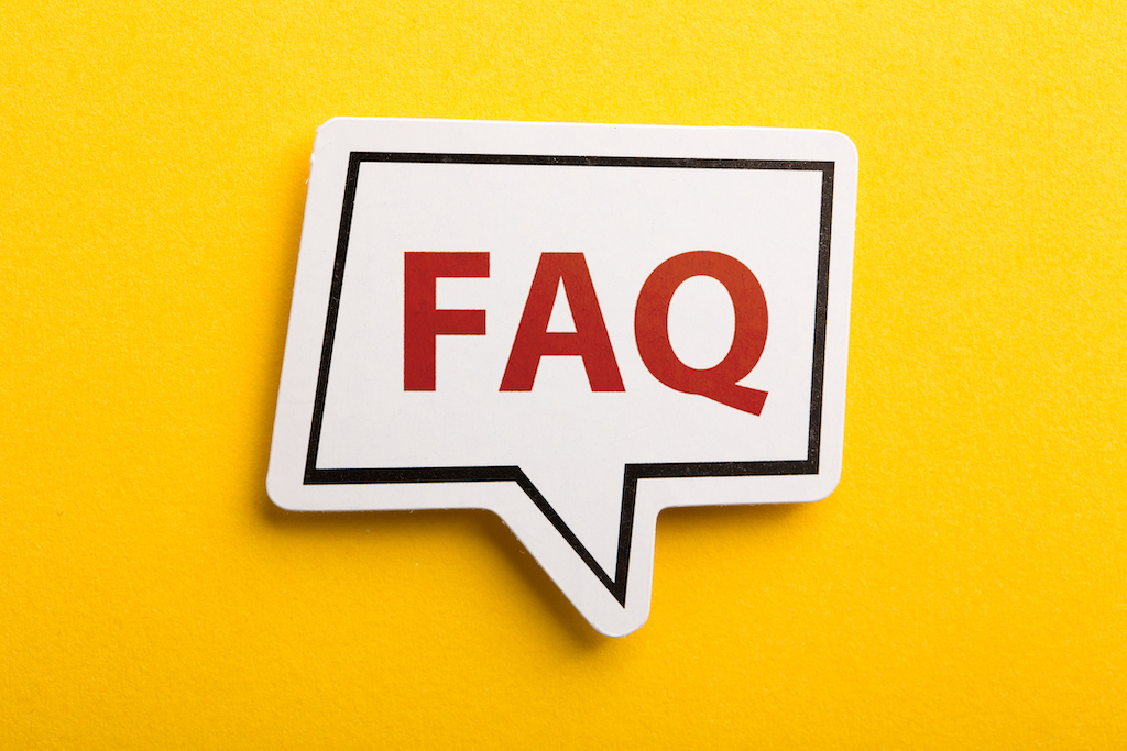 Red FAQ in speech bubble on yellow background. FAQs about outdoor lighting.