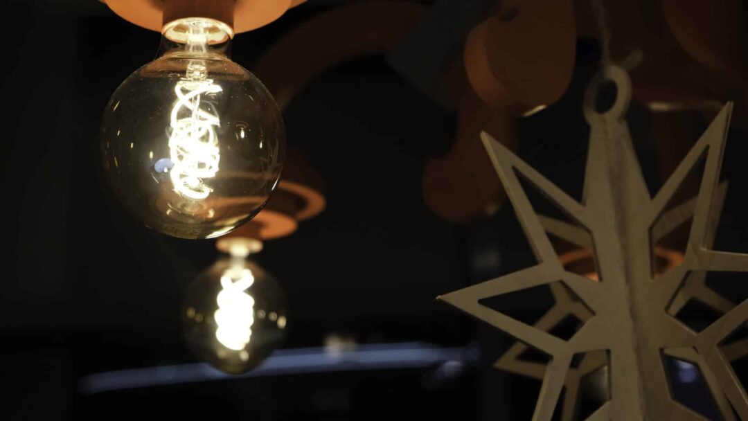 Flickering lights with decor at background.