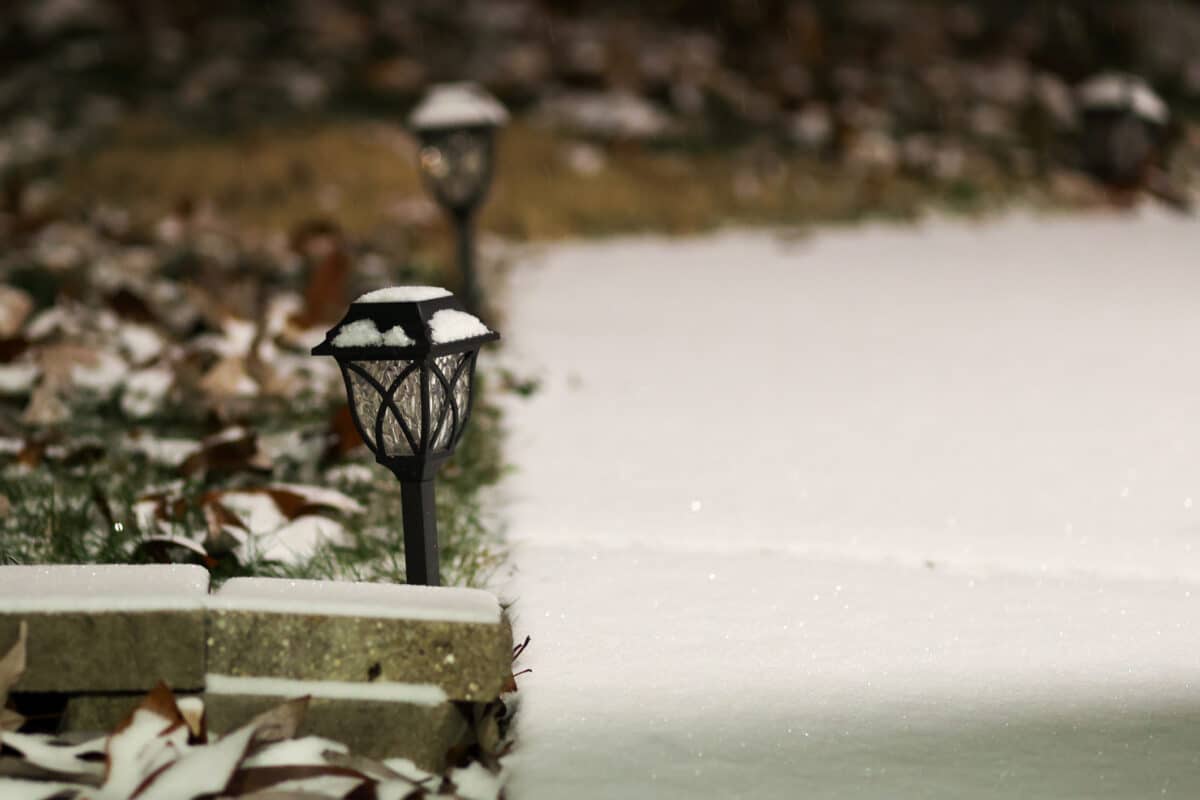 Snow covered outdoor lighting.