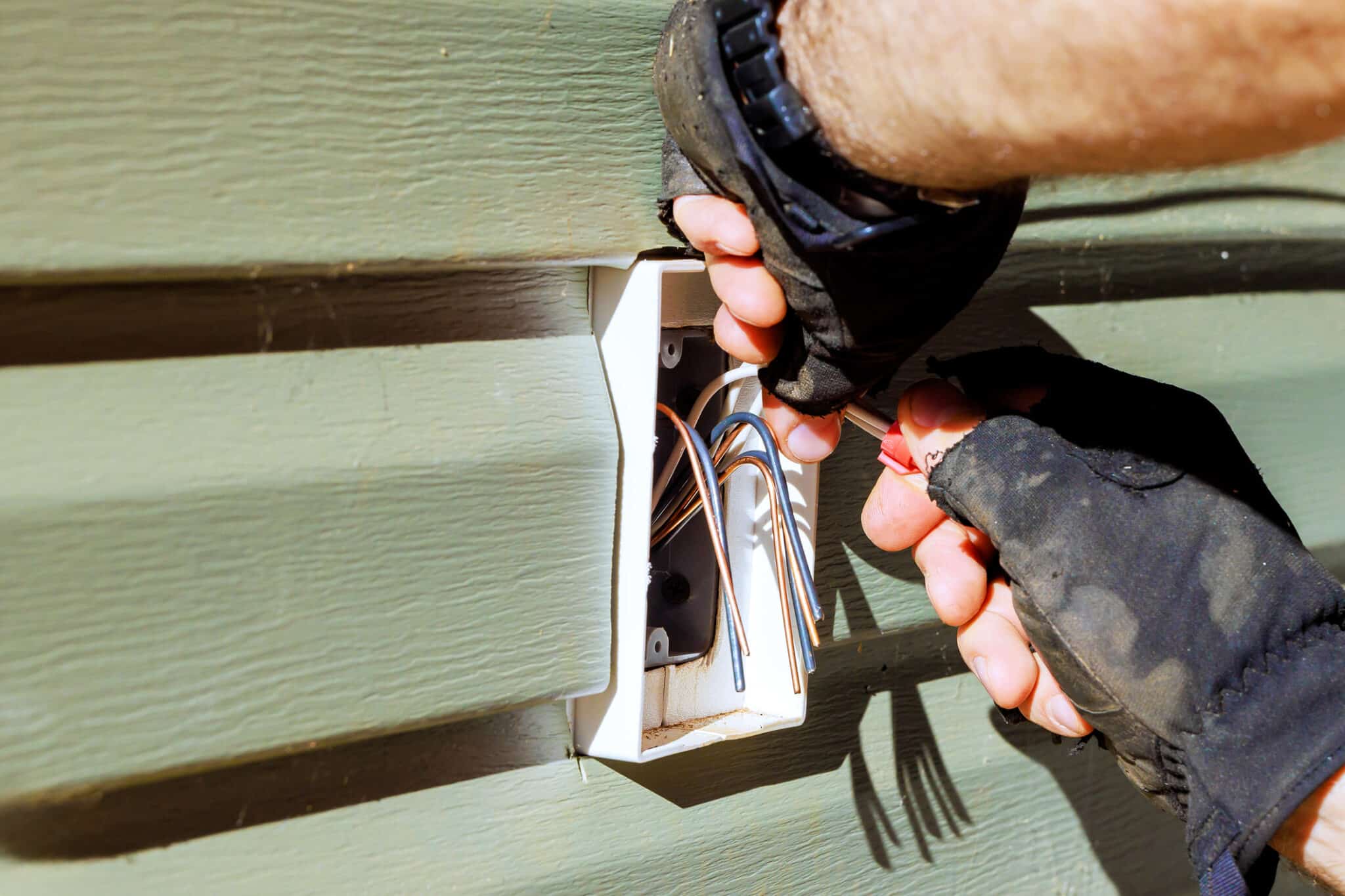 Outdoor Installation of Upgraded Wiring.